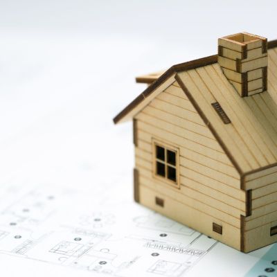 Miniature house model with house layout plan